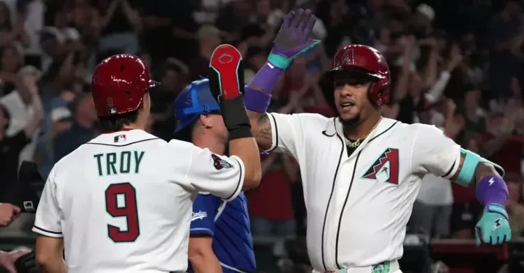 Diamondbacks sorprenden a Dodgers con poder de Marte y Arenado
